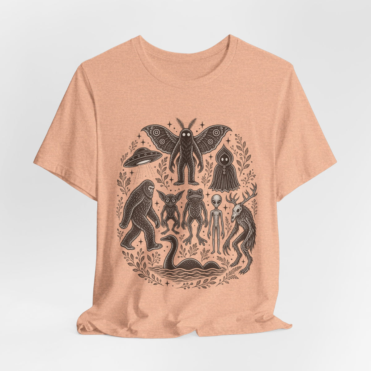 Legendary Cryptid Roster Tee in Heather Peach - funny cryptid lineup shirt, Barely Outdoorsy Bella Canvas 3001
