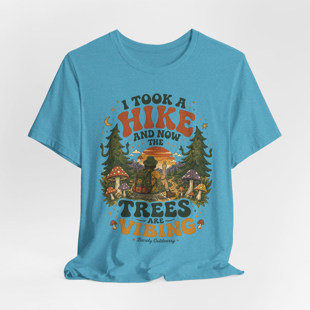 Person wearing funny hiking trees vibing shirt outdoor lifestyle photo