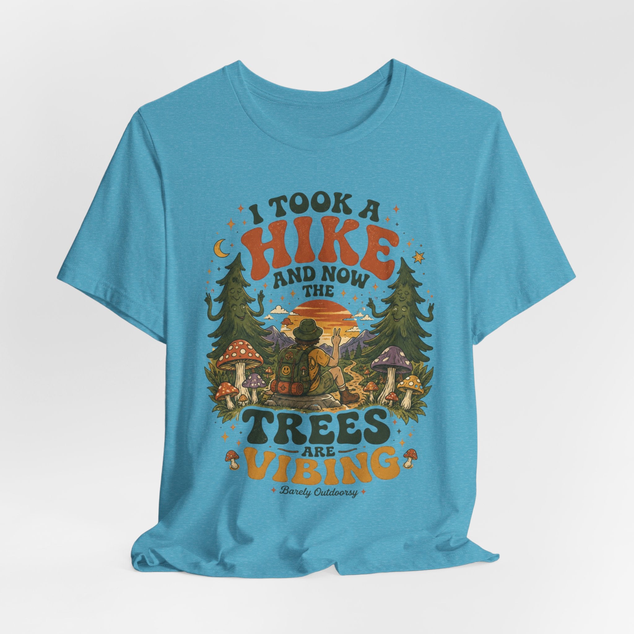 Person wearing funny hiking trees vibing shirt outdoor lifestyle photo