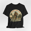 Don't Be An Assquatch Bigfoot Tee in White - funny Bigfoot assquatch pun shirt, Barely Outdoorsy Bella Canvas