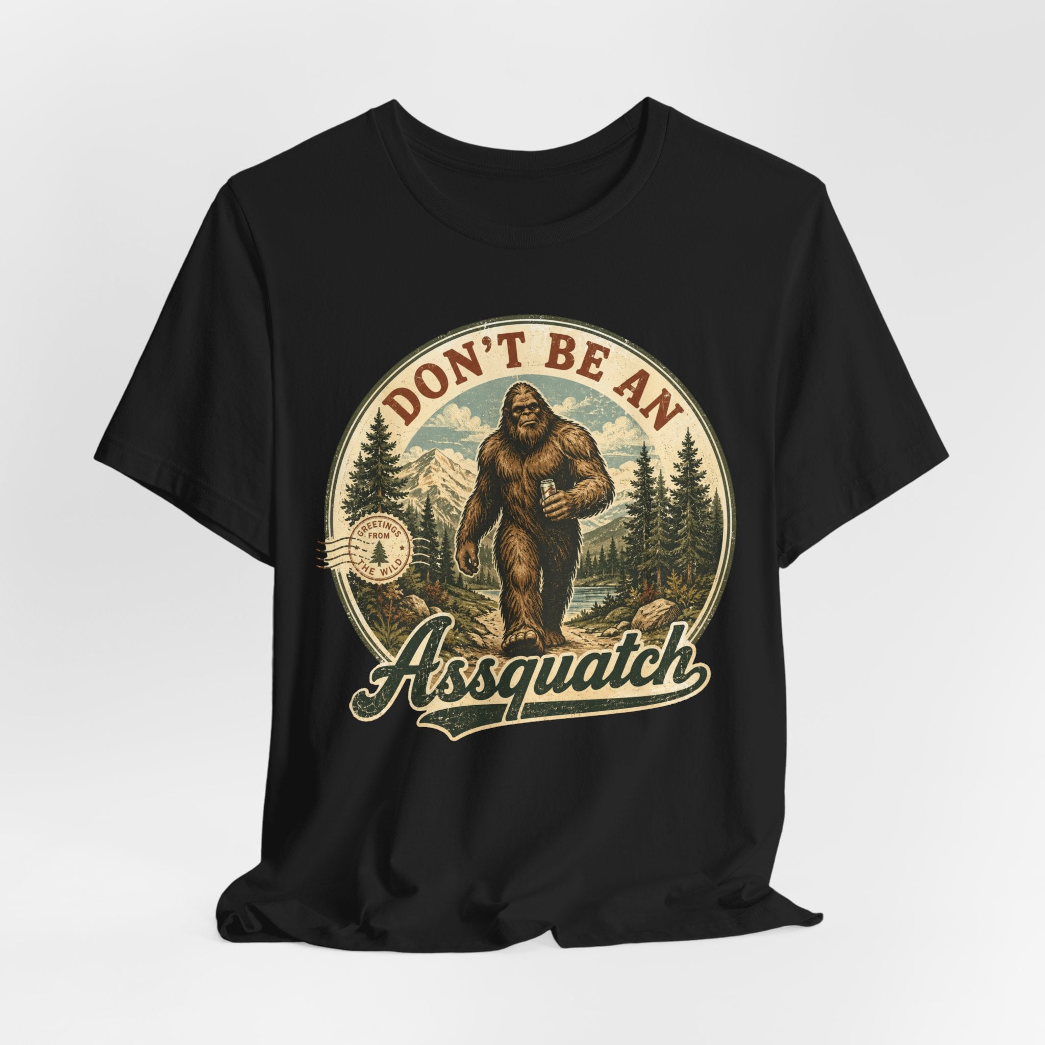 Don't Be An Assquatch Bigfoot Tee in White - funny Bigfoot assquatch pun shirt, Barely Outdoorsy Bella Canvas
