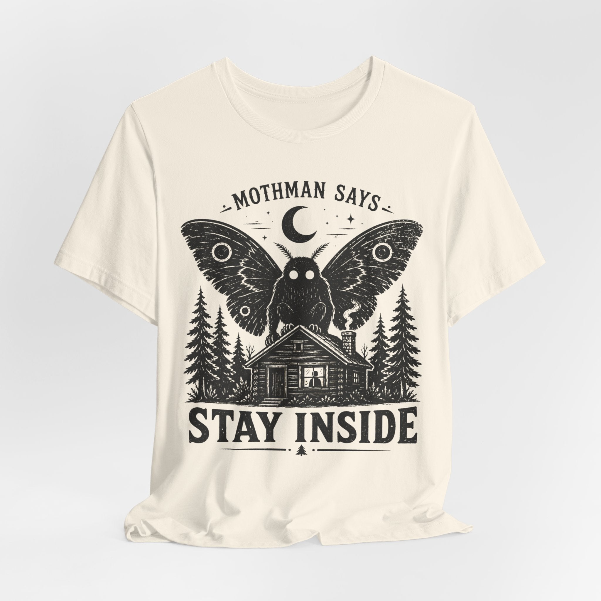 Mothman Says Stay Inside T-Shirt in Heather Peach - funny Mothman stay inside cryptid graphic tee, Barely Outdoorsy Bella Canvas