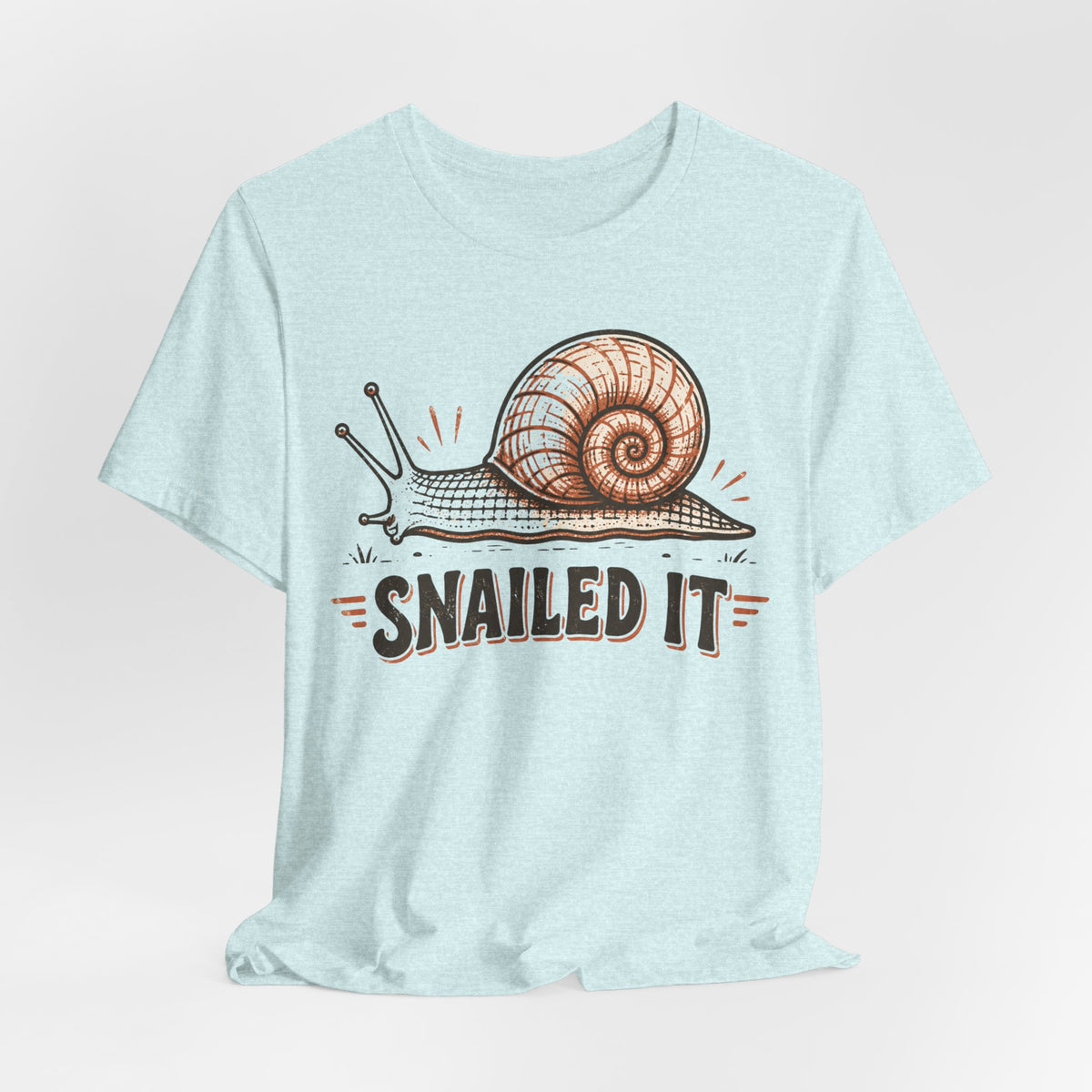 Snailed It T-Shirt in Heather Peach detail - snail pun slow living close-up graphic, Barely Outdoorsy Bella Canvas 3001