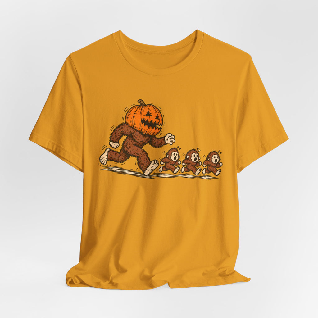 Pumpkin Head Bigfoot Halloween T-Shirt in Heather Tan - funny pumpkin head Bigfoot graphic tee, Barely Outdoorsy Bella Canvas