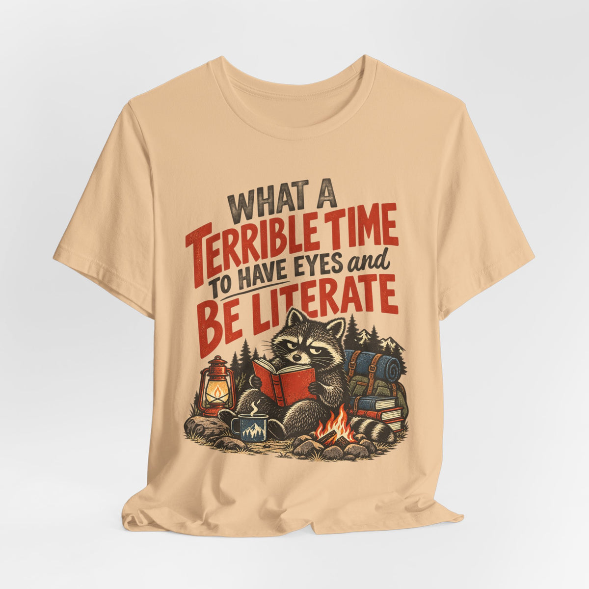 Terrible Time to Be Literate Camping Raccoon Tee in Dusty Blue worn shot - funny raccoon camping literate shirt, Barely Outdoorsy Bella Canvas