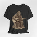 Bigfoot Guitar Tee flat lay Dark Grey Heather - unisex crew neck vintage Bigfoot guitar graphic tee, Barely Outdoorsy