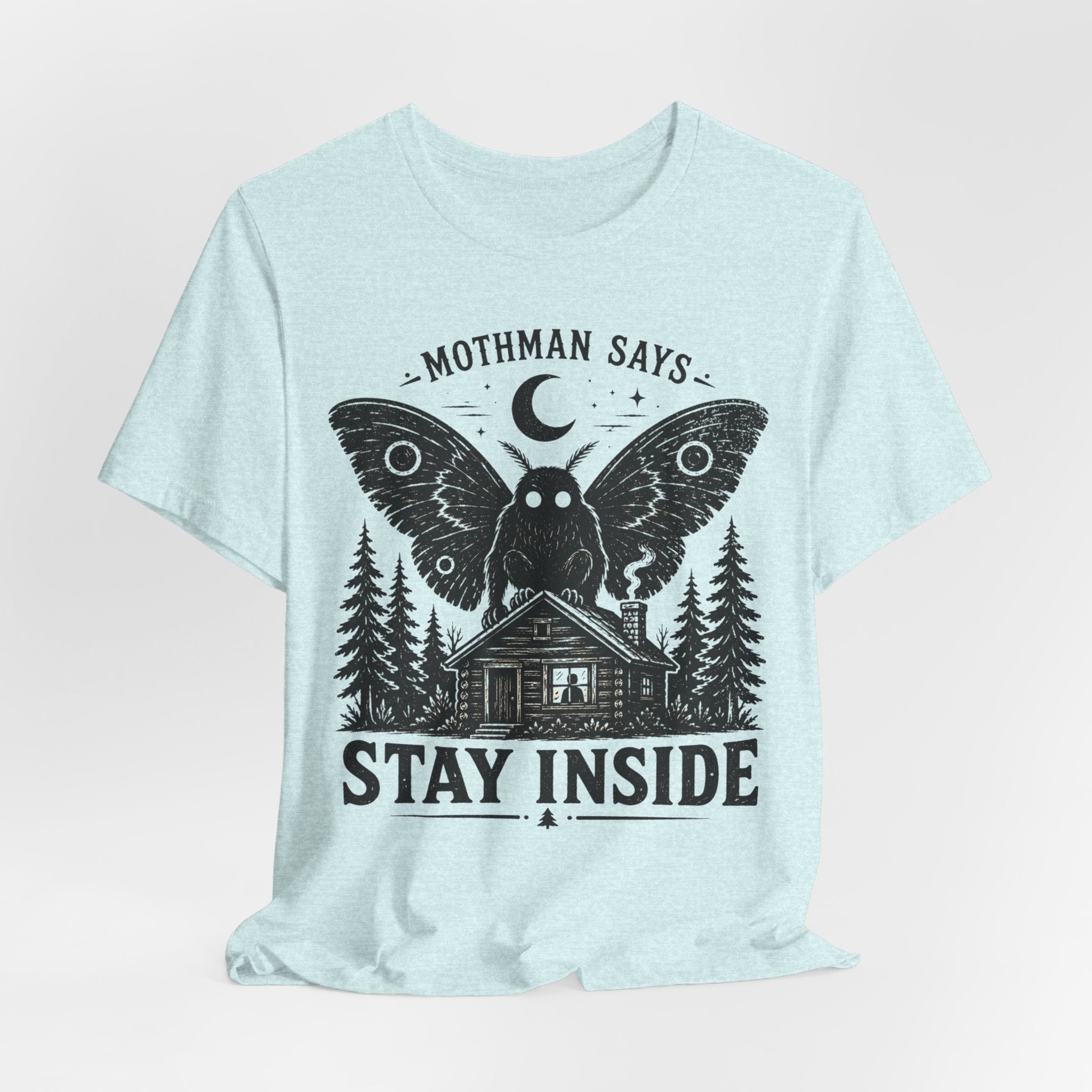 Mothman Says Stay Inside T-Shirt in Heather Peach worn shot - funny Mothman paranormal shirt, Barely Outdoorsy Bella Canvas