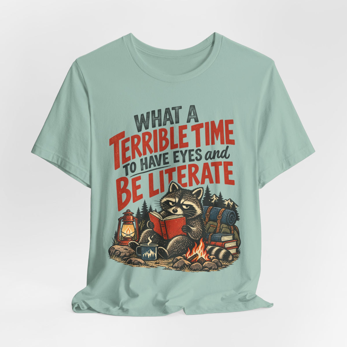 Terrible Time to Be Literate Camping Raccoon T-Shirt flat lay Sand Dune - unisex raccoon camping literate shirt, Barely Outdoorsy