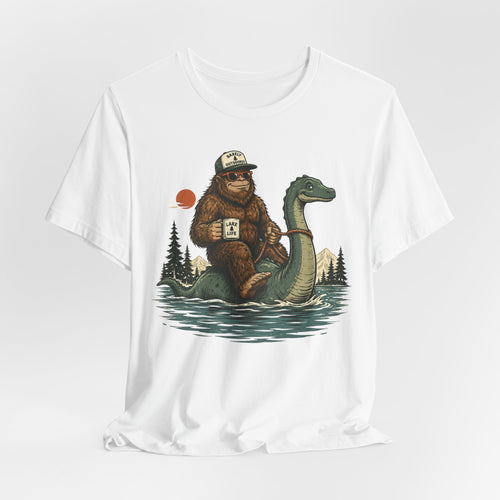 Close-up of illustrated Sasquatch wearing sunglasses and trucker hat riding Nessie across a mountain lake at sunset with pine trees