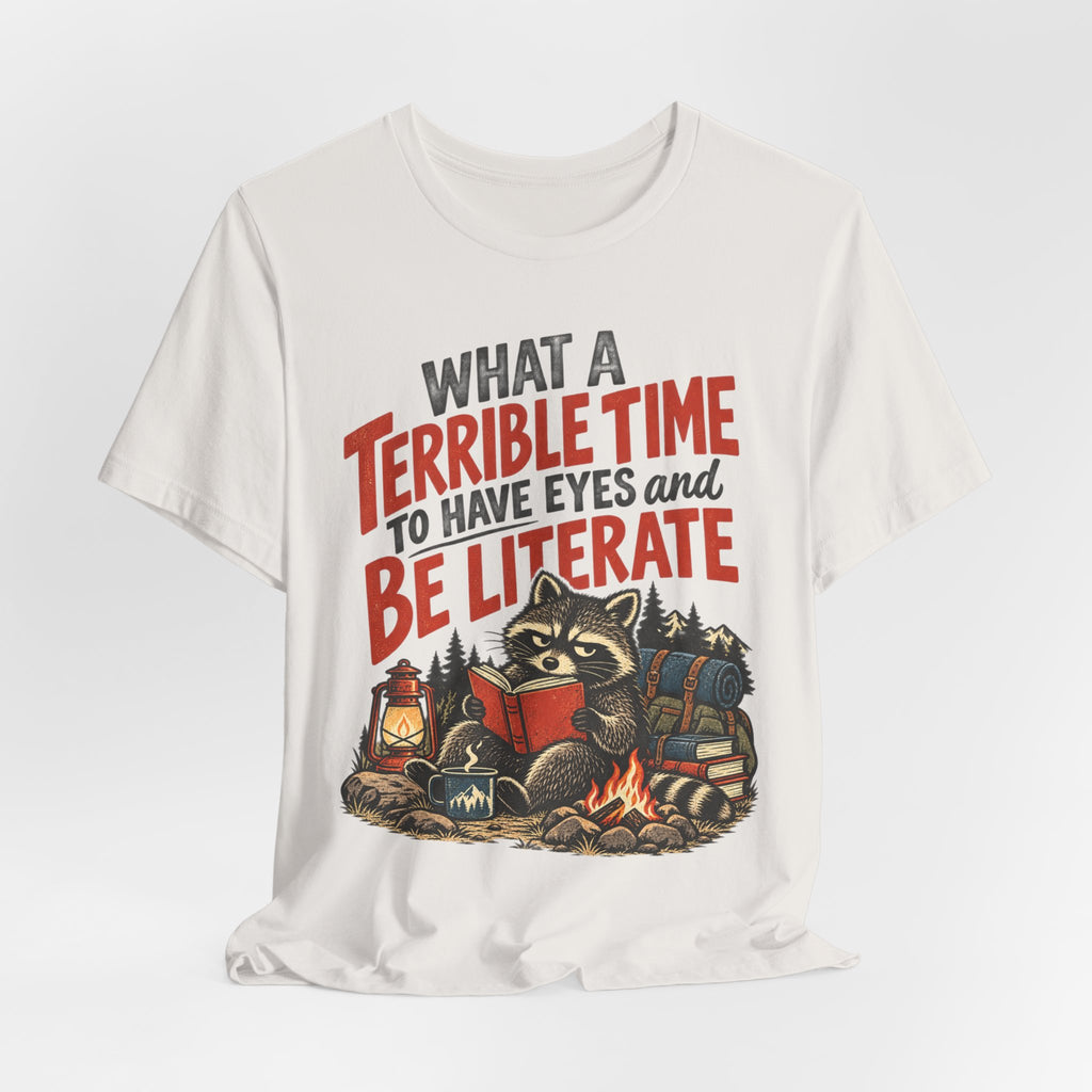 Terrible Time to Be Literate Camping Raccoon T-Shirt in Vintage White - funny camping raccoon literate humor graphic tee, Barely Outdoorsy Bella Canvas 3001