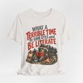 Terrible Time to Be Literate Camping Raccoon T-Shirt in Vintage White - funny camping raccoon literate humor graphic tee, Barely Outdoorsy Bella Canvas 3001