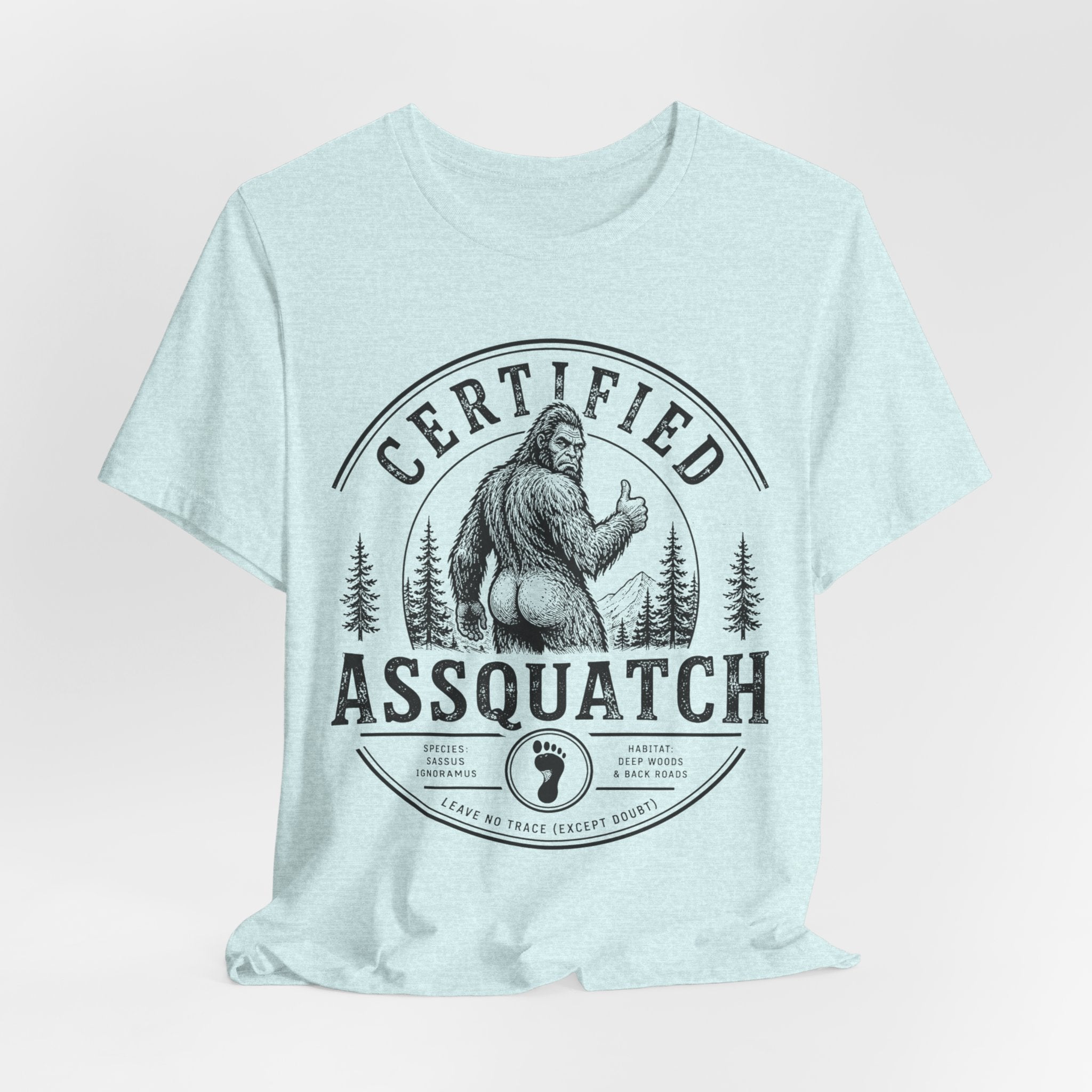 Certified Assquatch T-Shirt in Heather Peach worn shot - funny Bigfoot pun humor shirt, Barely Outdoorsy Bella Canvas