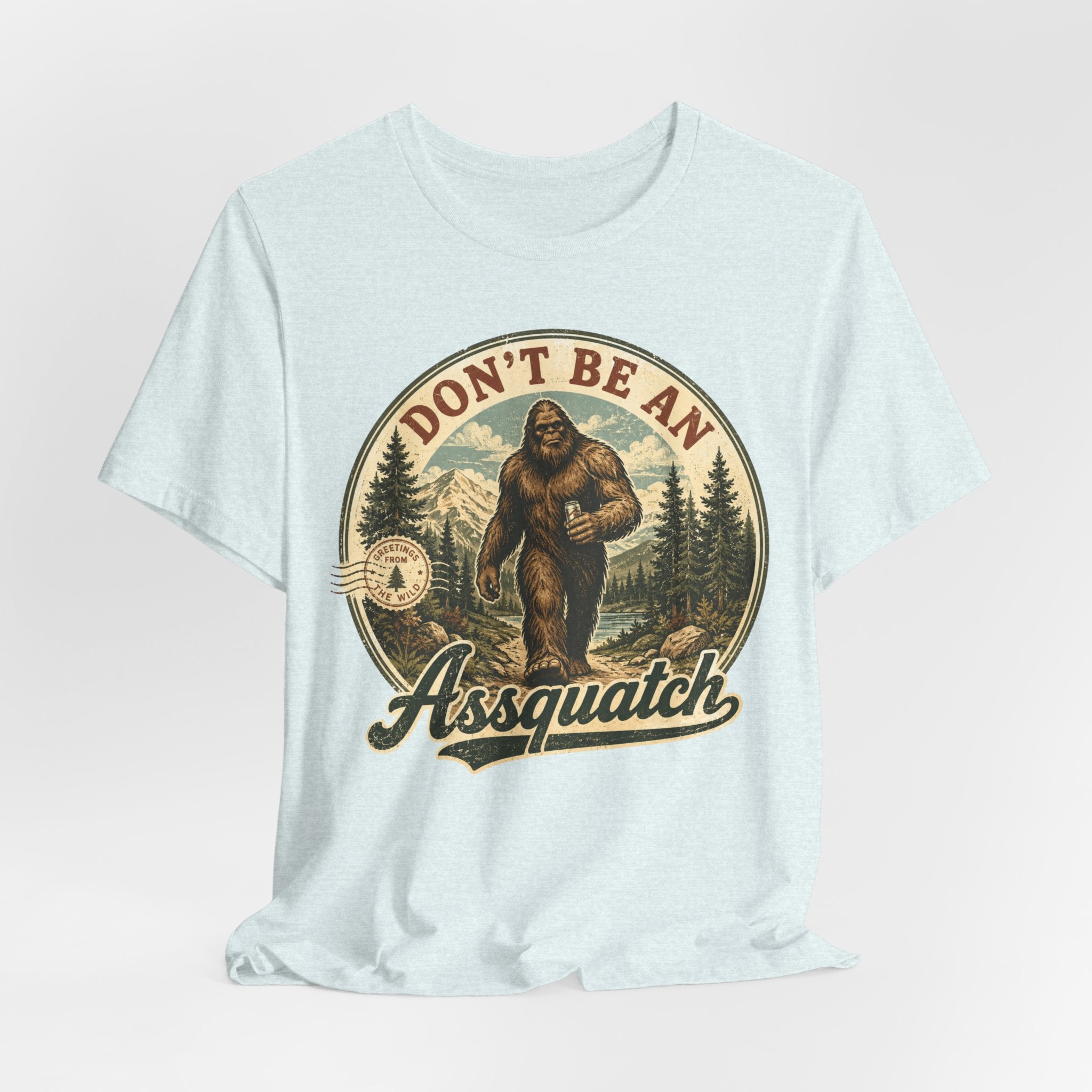 Don't Be An Assquatch Funny Bigfoot T-Shirt in Heather Ice Blue - funny Sasquatch pun humor graphic tee, Barely Outdoorsy