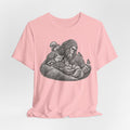 Guardian of the Forest Bigfoot Tee in Heather Peach worn shot - painterly Bigfoot forest shirt, Barely Outdoorsy Bella Canvas
