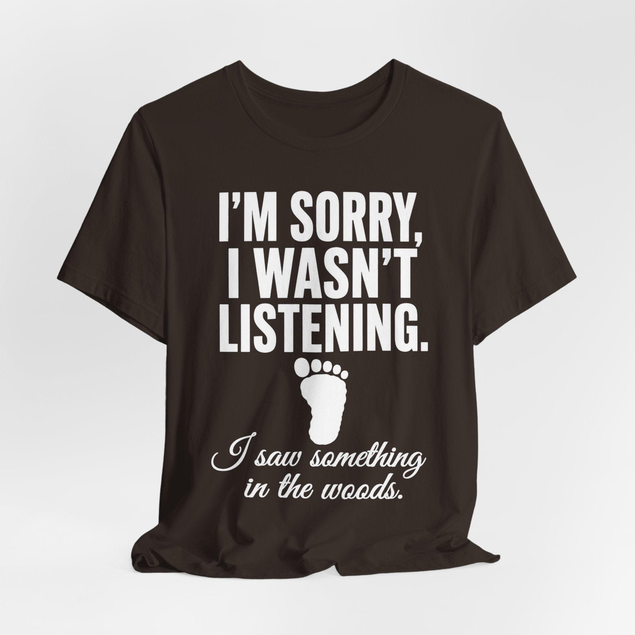 I Saw Something In The Woods Tee in Brown - Sasquatch footprint statement graphic shirt, Barely Outdoorsy Bella Canvas 3001
