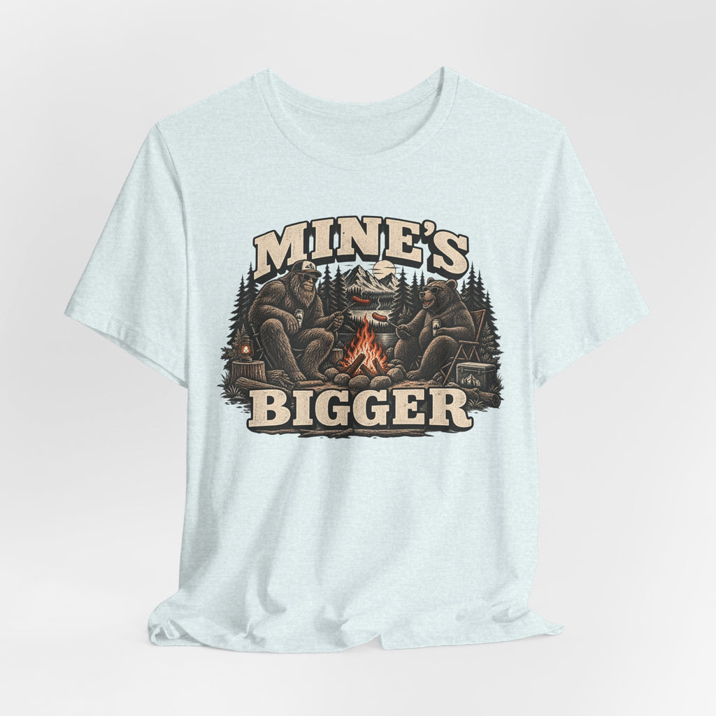 Mine's Bigger Funny Bigfoot T-Shirt in Heather Ice Blue - funny Bigfoot campfire shadow graphic tee, Barely Outdoorsy