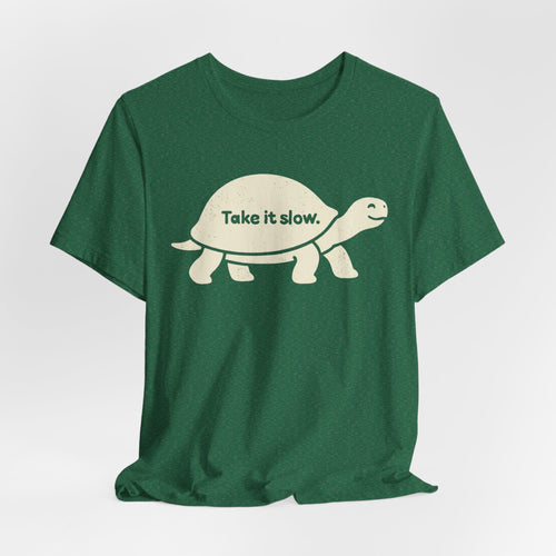 Take It Slow T-Shirt in Heather Purple - minimalist turtle graphic tee for unhurried wanderers, Barely Outdoorsy