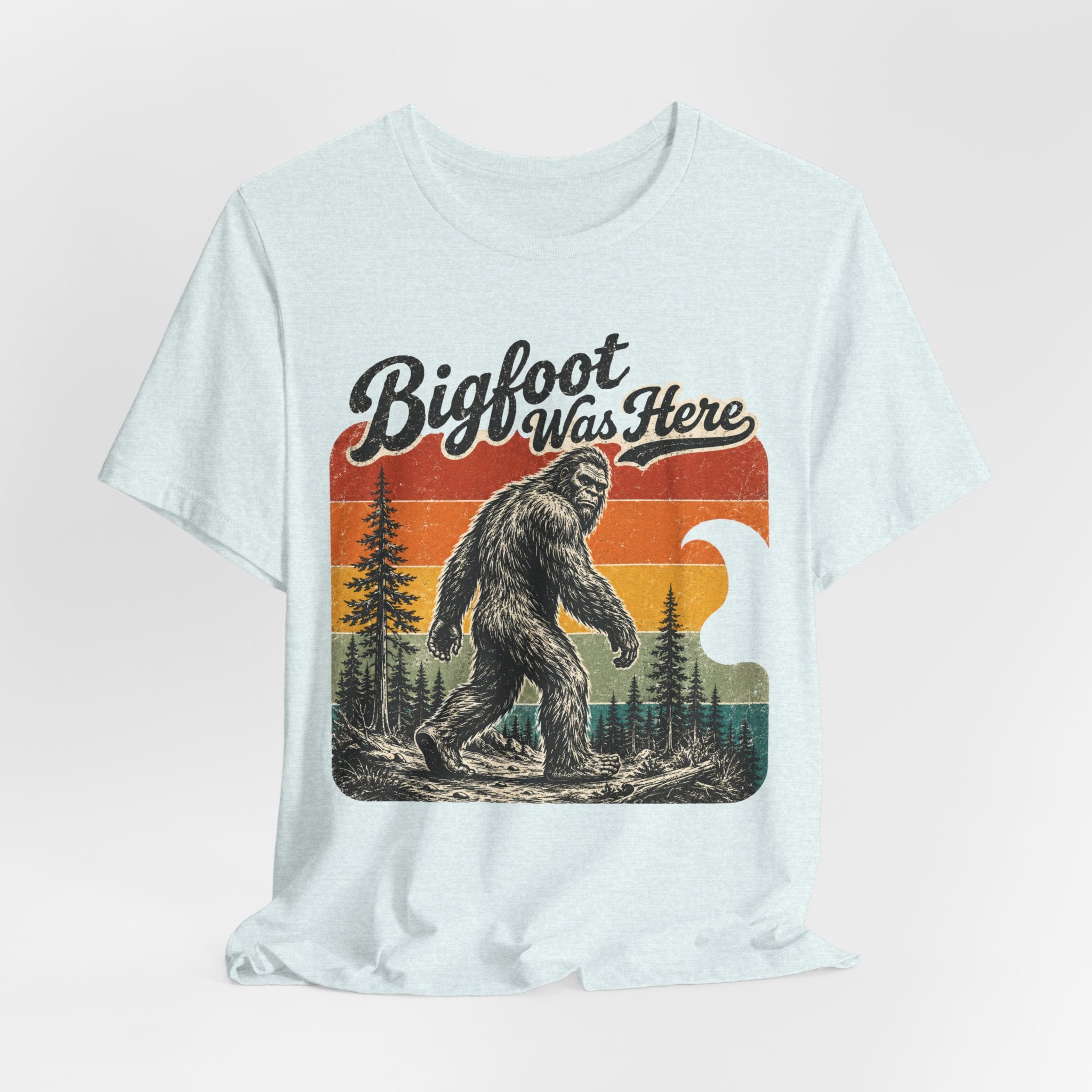 Bigfoot Was Here Tee in Heather Ice Blue - classic Bigfoot silhouette forest sunset shirt, Barely Outdoorsy Bella Canvas