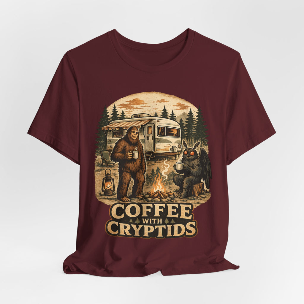 Coffee With Cryptids T-Shirt in Heather Peach - Bigfoot Mothman Chupacabra UFO coffee graphic tee, Barely Outdoorsy