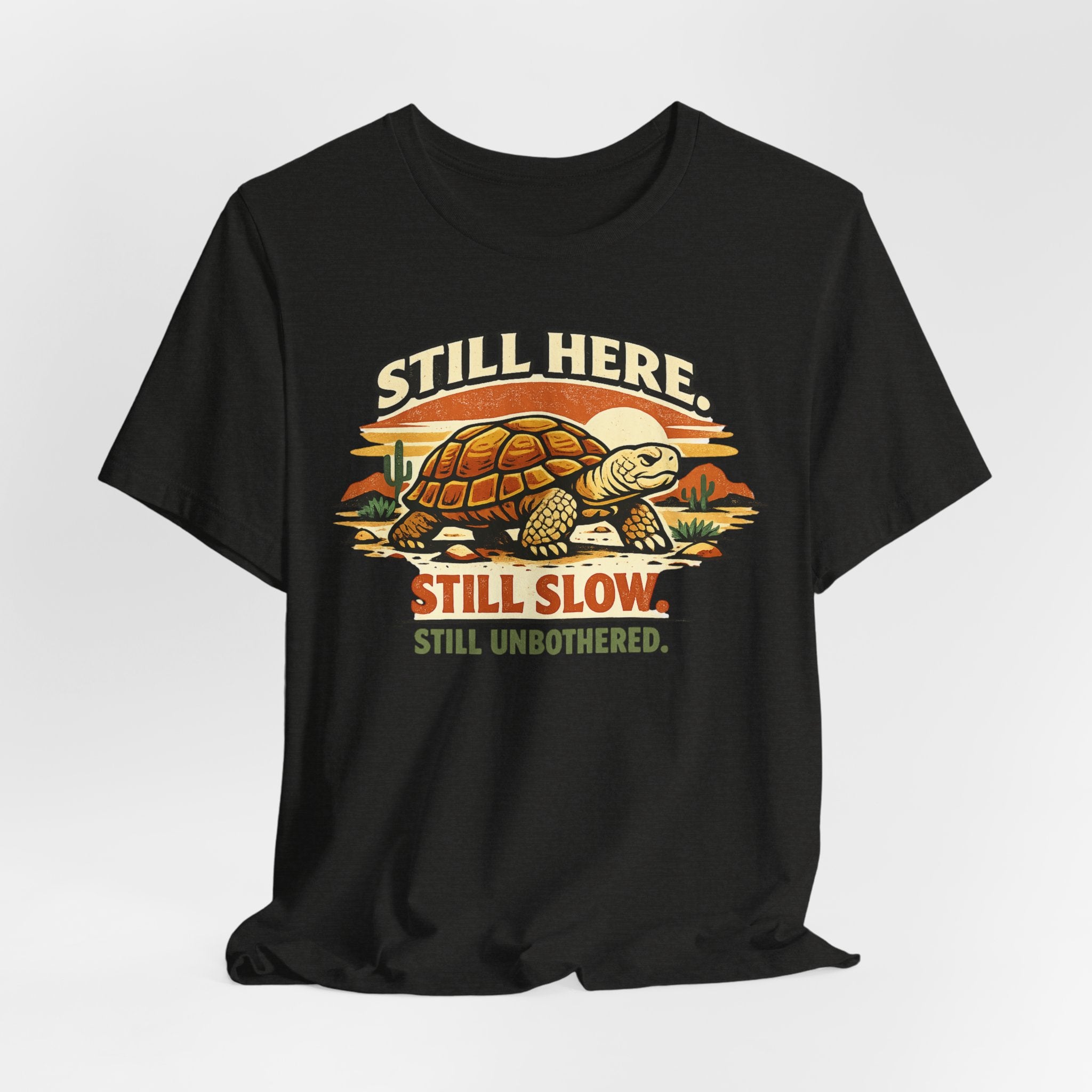 Still Here Still Slow Still Unbothered Tee in White detail - vintage tortoise slow pace close-up graphic