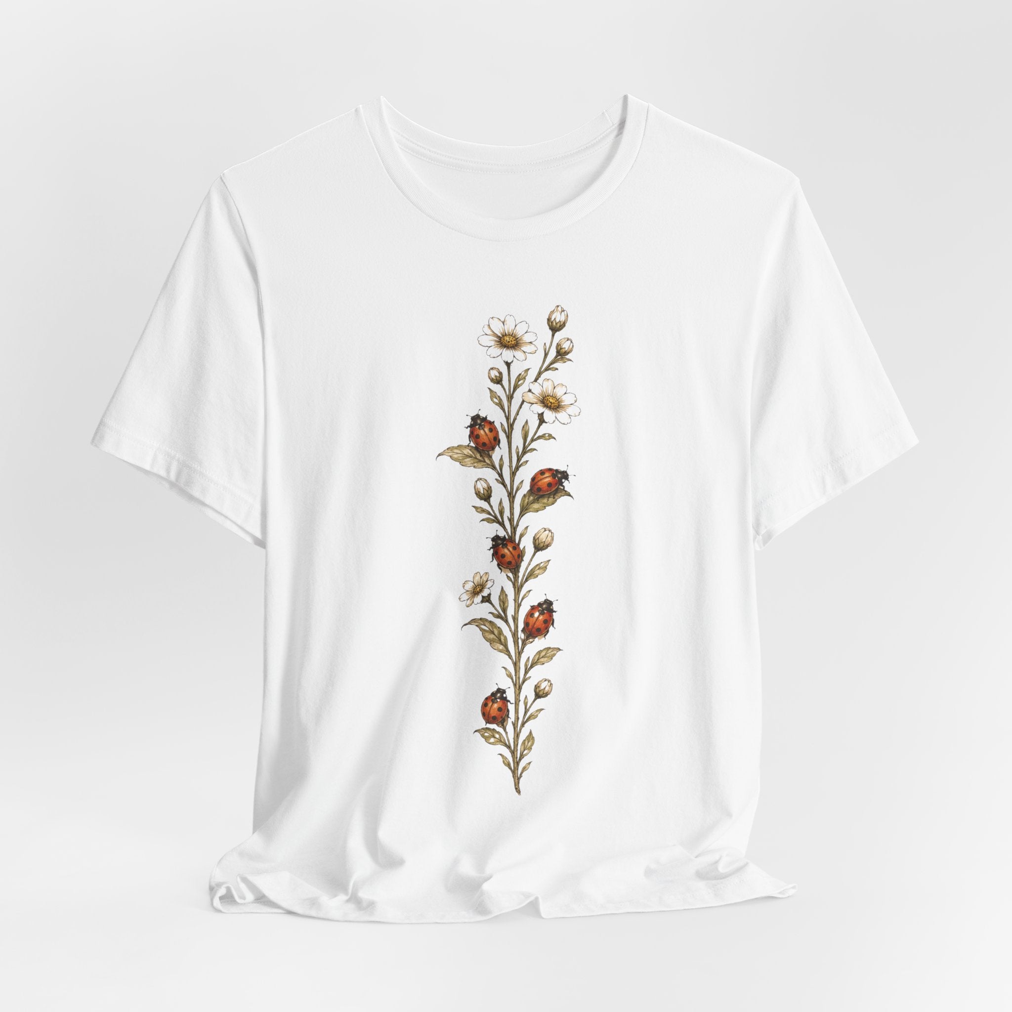 Ladybug Daisy Vine Botanical Tee in White detail - ladybug daisy botanical vine close-up graphic