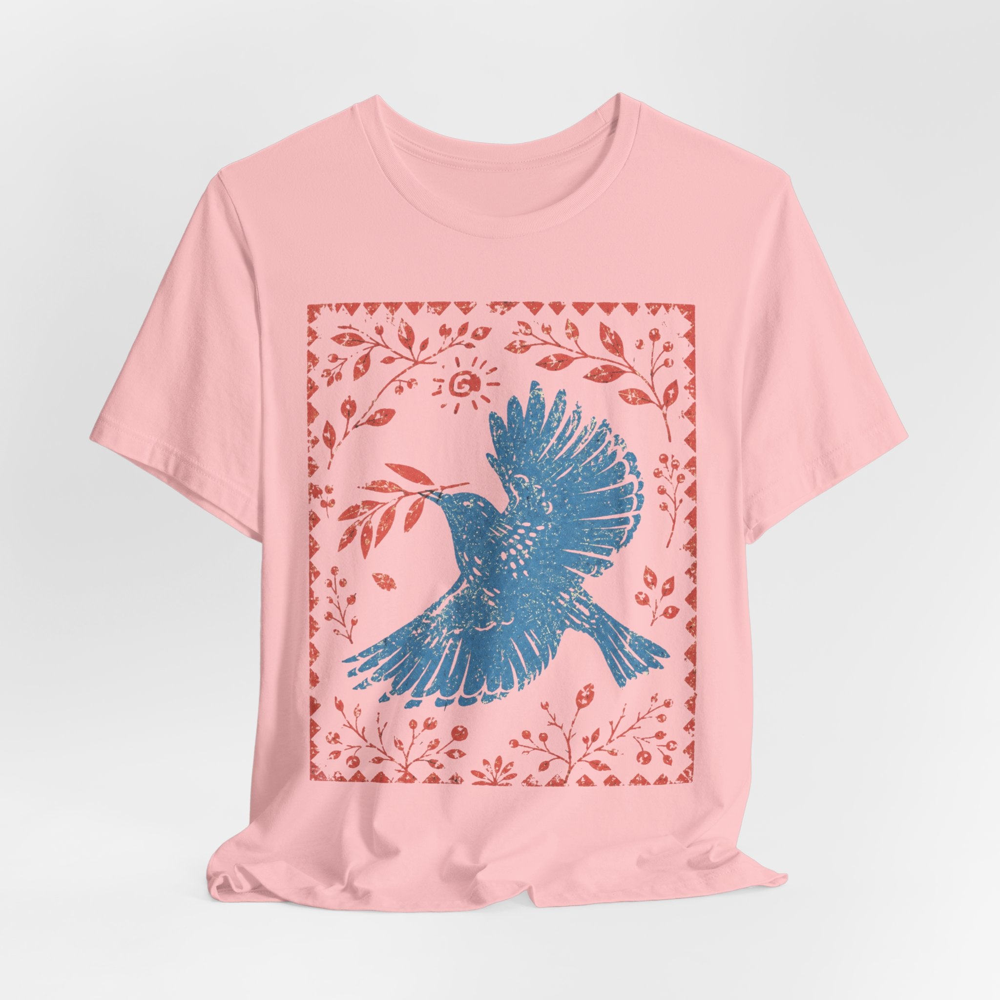 Blue Peace Dove Folk Art T-Shirt in Pink detail - folk art peace dove close-up graphic, Barely Outdoorsy Bella Canvas