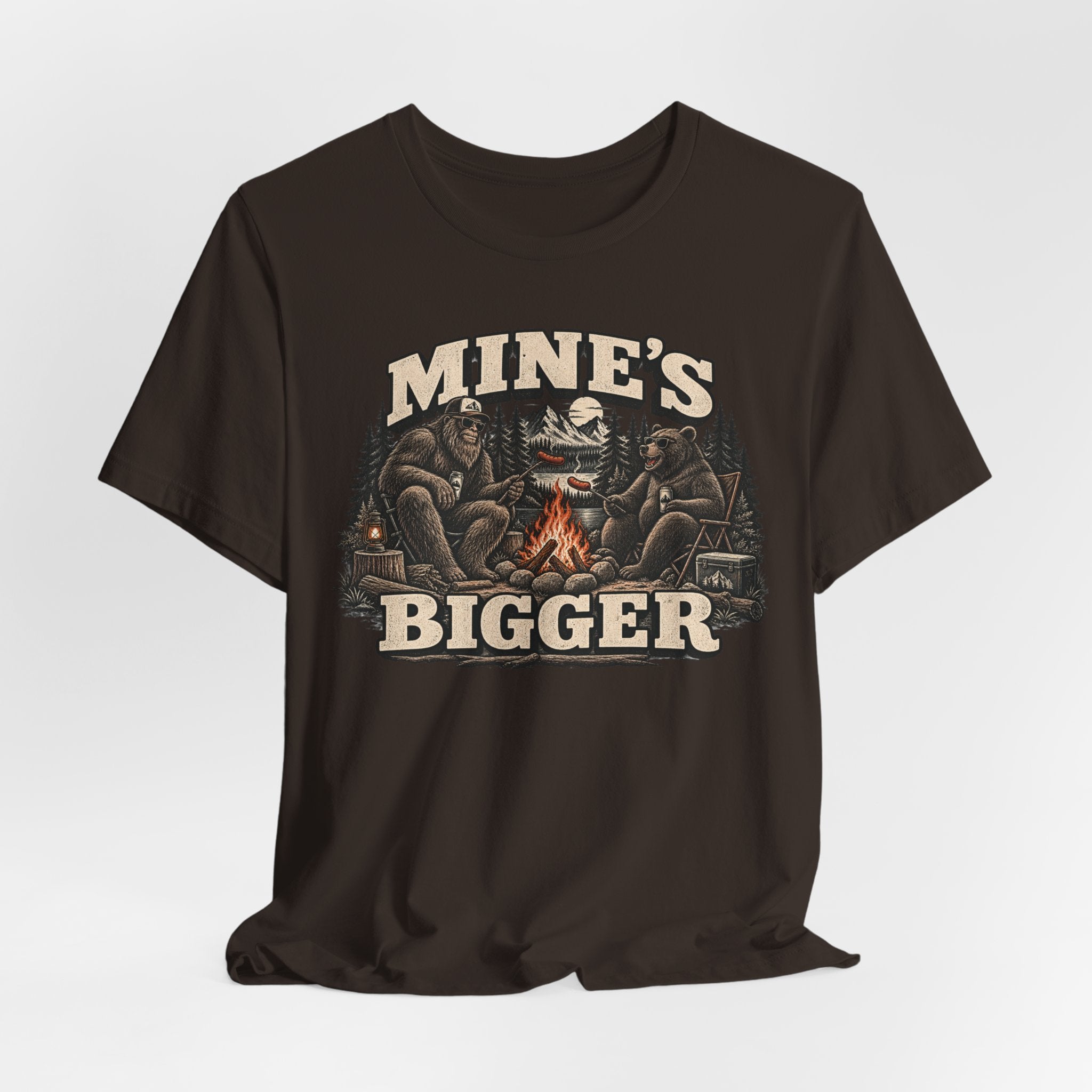 Mine's Bigger Funny Bigfoot T-Shirt in Black - funny Bigfoot campfire shadow humor graphic tee, Barely Outdoorsy Bella Canvas 3001