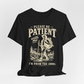 Please Be Patient I'm From The 1900s Tee in Black worn shot - vintage hiker Gen X humor shirt, Barely Outdoorsy