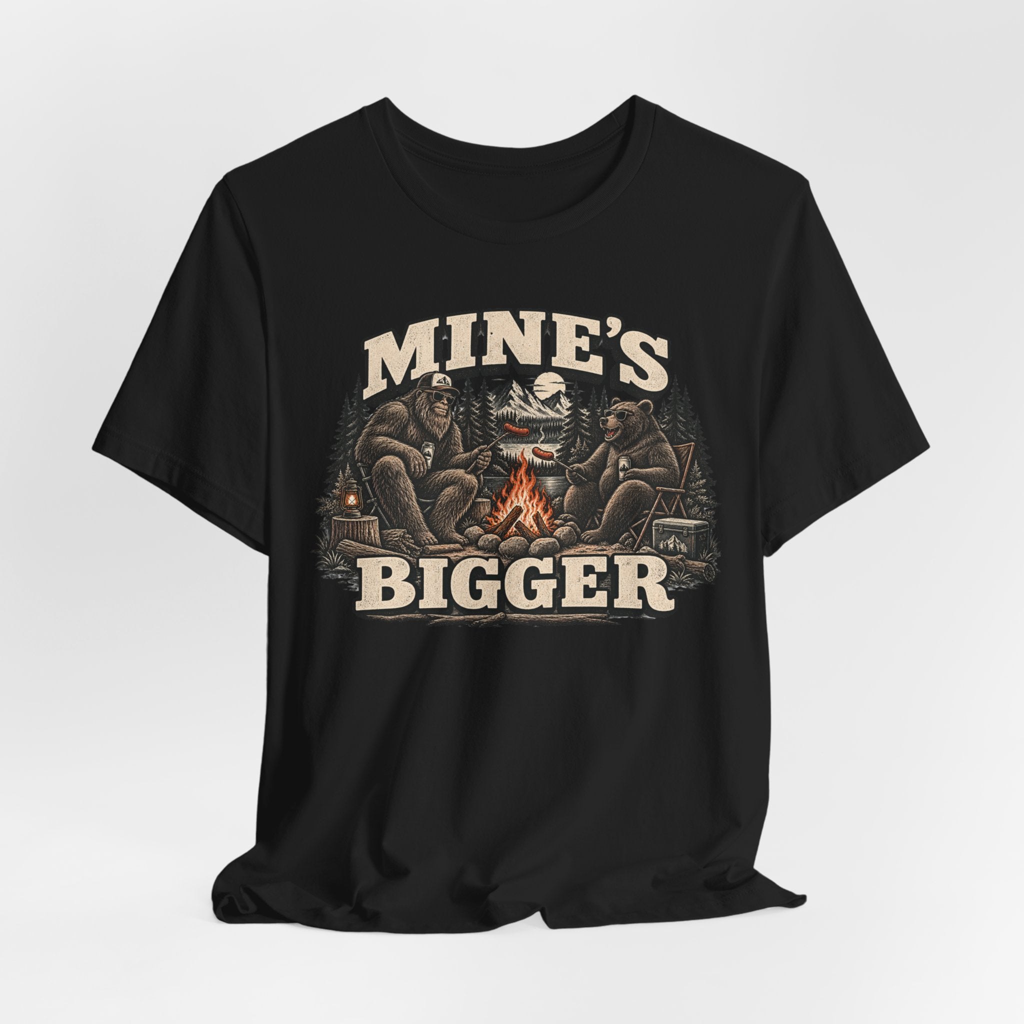 Mine's Bigger Bigfoot Tee in White - funny Sasquatch campfire shadow humor shirt, Barely Outdoorsy Bella Canvas