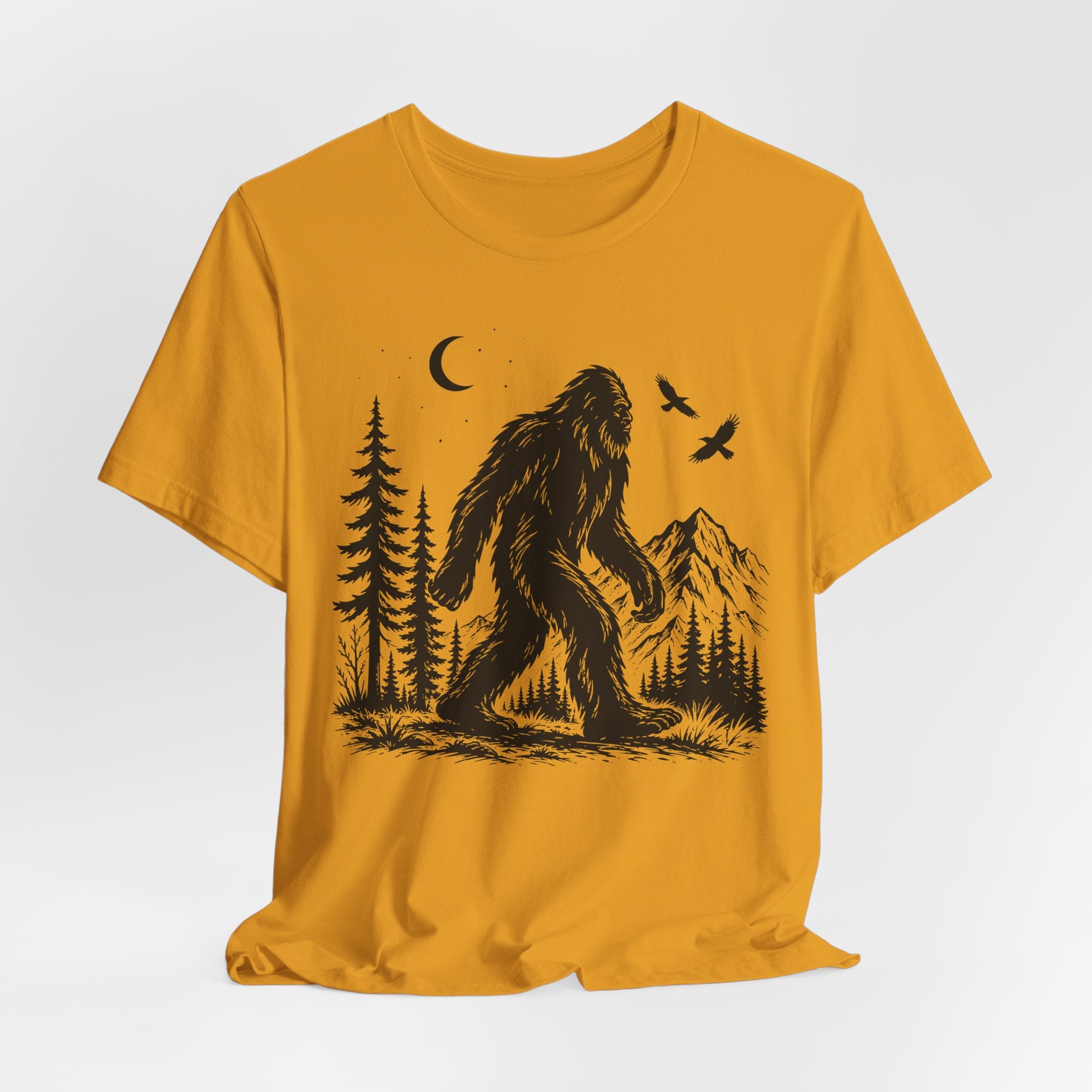 Bigfoot Night Forest Mountain T-Shirt in White worn shot - painterly Bigfoot night mountain shirt, Barely Outdoorsy