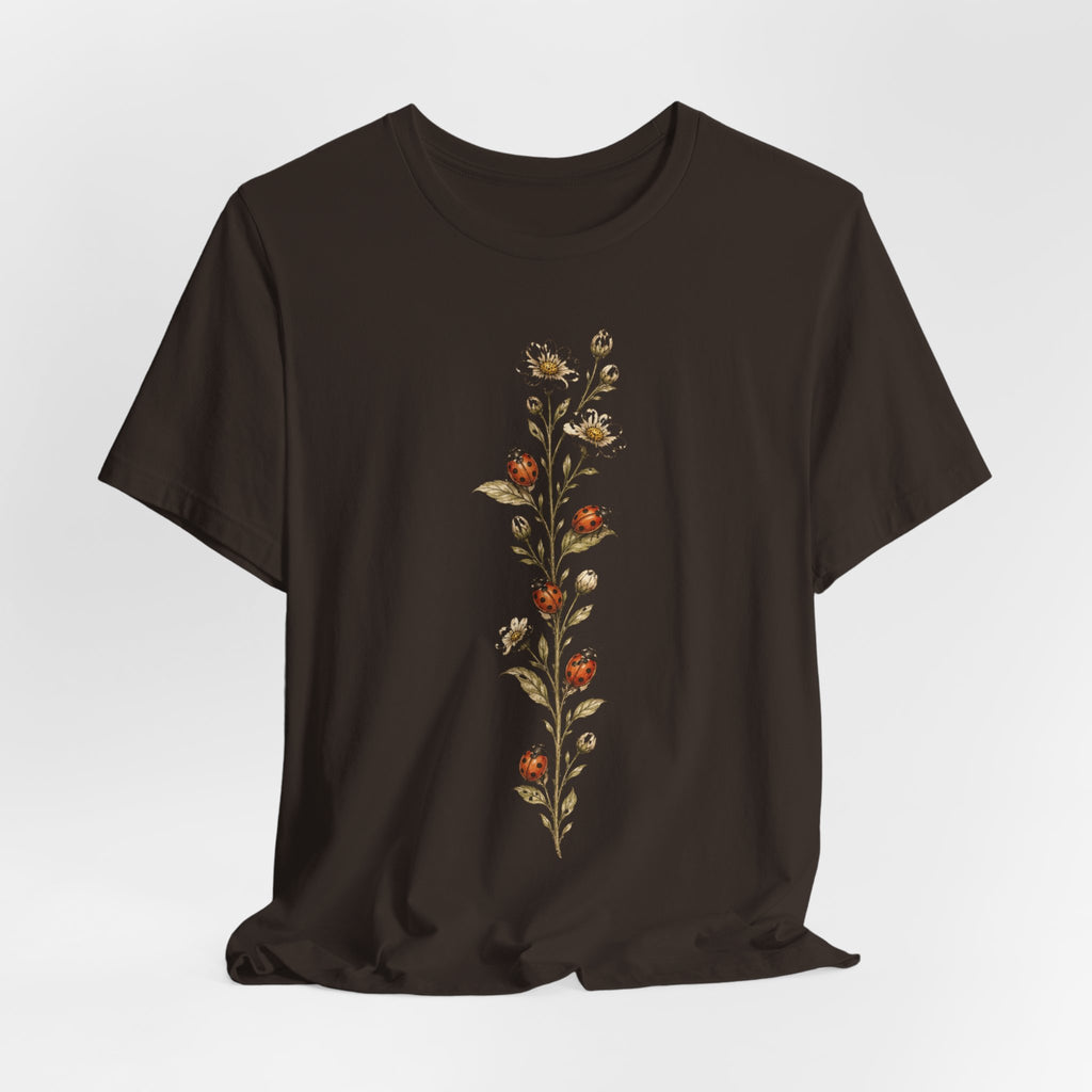 Ladybug Daisy Vine Botanical T-Shirt in Heather Peach worn shot - cottagecore botanical ladybug shirt, Barely Outdoorsy Bella Canvas