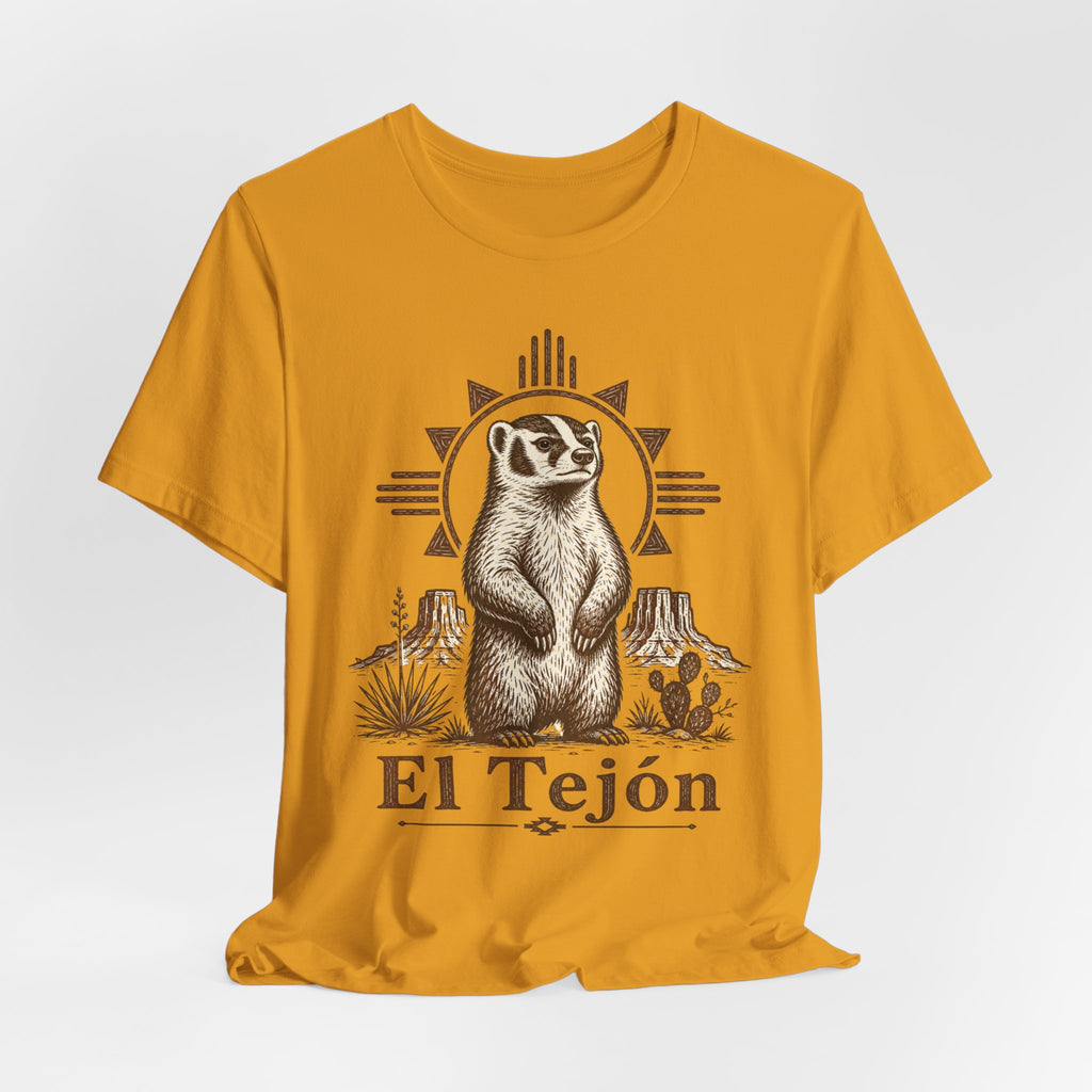 El Tejón Badger T-Shirt flat lay Heather Peach - unisex crew neck Southwest badger graphic tee, Barely Outdoorsy